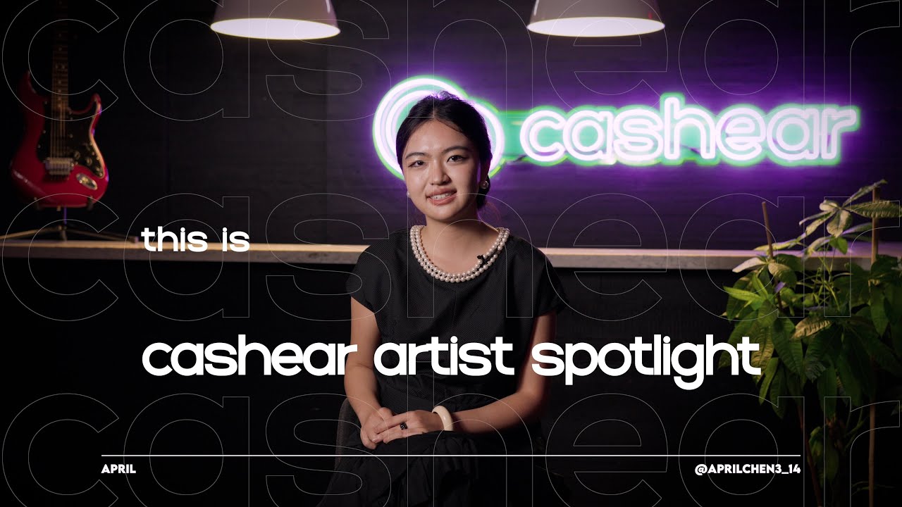 April in a black dress and pearl necklace on the Artist Spotlight set