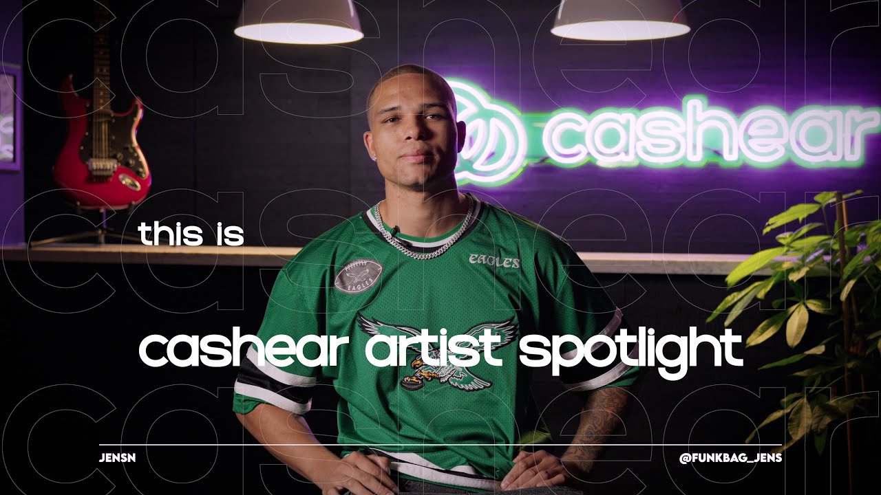 JENSN in a green Eagles jersey and chain on the Artist Spotlight set