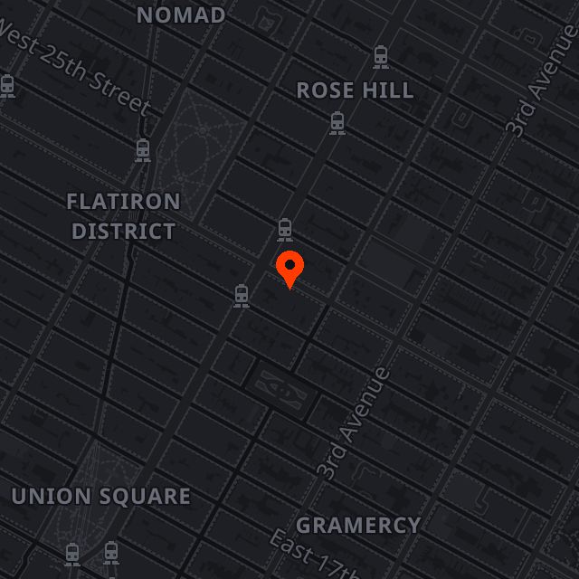 Dark Manhattan street map with orange marker at JPX Studios on East 23rd Street