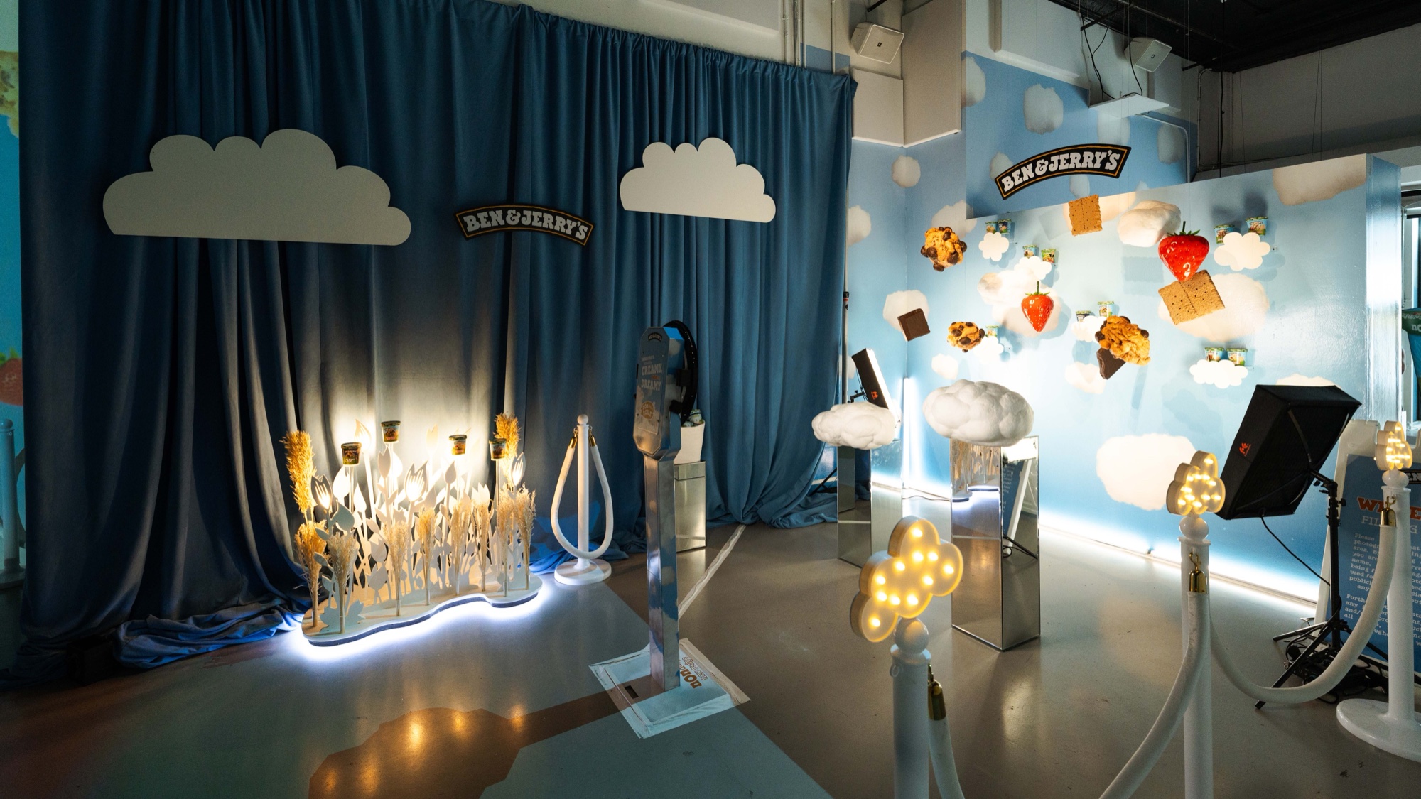 Blue curtains, cardboard clouds, glowing wheat and sweets covering a sky wall fill the Ben & Jerry’s set