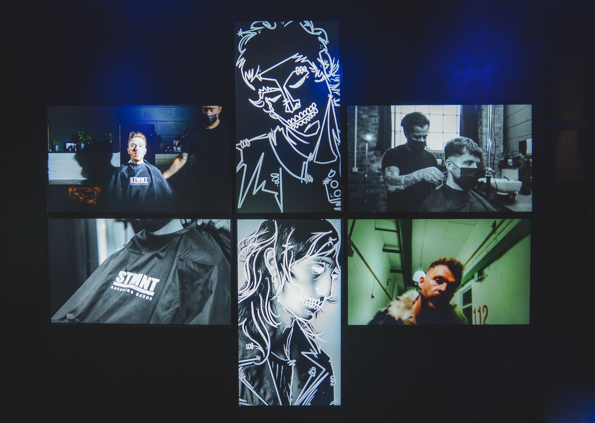 Cross shaped grid of screens showing barbershop scenes and white line drawings of faces against a dark wall